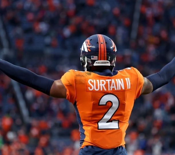 denver broncos nfl player patrick surtain ii playing in a football game